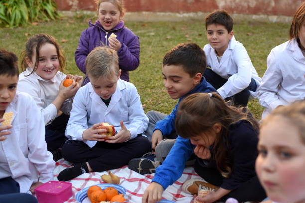 istock children eating fruit in the schoolyard 1407772627