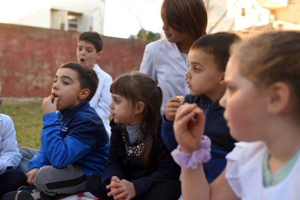 istock children eating fruit in the schoolyard 1407772642