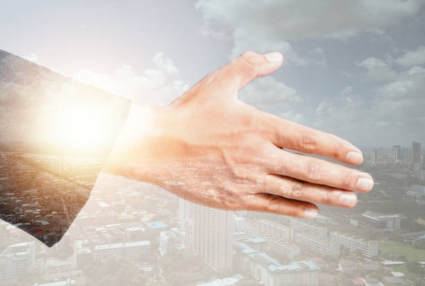 istock double exposure businessman and commercial building concept cooperation agreement between business entities 1407777553