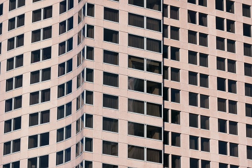 Architectural features of a high rise building in the central business district of Sydney overlooking the harbour.  This image was taken on an afternoon in winter.