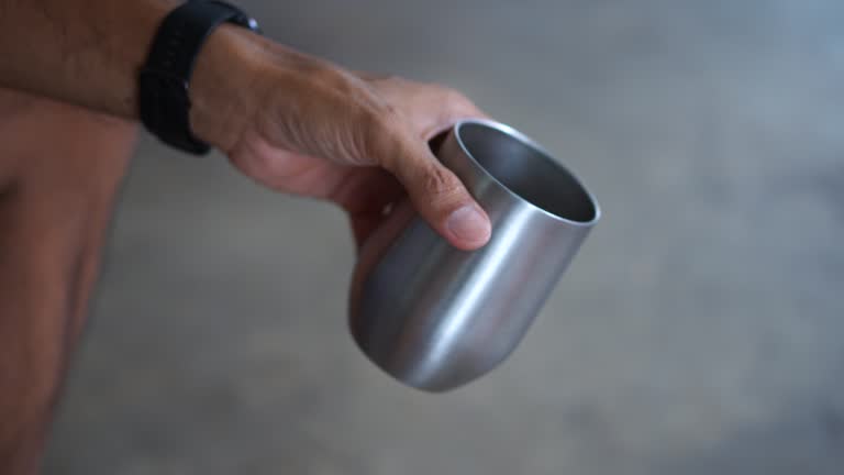 Close-up at man drinking coffee