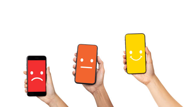 istock Man hand holding mobile smartphone isolated on white background, customer experience concept, various mobile feedback. Great Mobile Customer Satisfaction Survey 1407779280