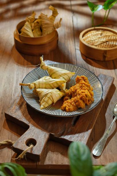 istock Ketupat palas with chicken rendang 1407780855