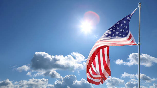 American flags on sky background. Independence Day concept. USA holiday.