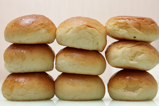 Sweet buns on white background