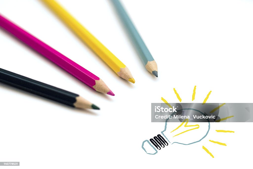 Colorful crayons drawing light bulb Set of four colorful crayons drawing light bulb, business idea concept Blue Stock Photo