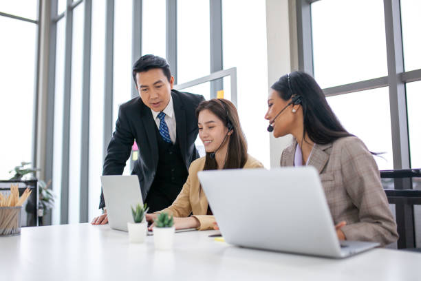 istock Supervisors teach work to employees in the office, Business concept. 1407788324