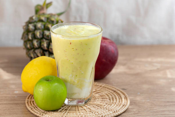istock colorful healthy fresh fruit smoothy with assorted ingredients serve in glass. 1407789029