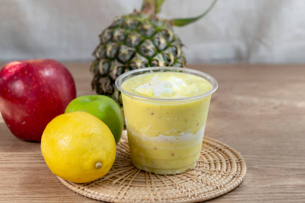 istock colorful healthy fresh fruit smoothy with assorted ingredients serve in glass. 1407789032