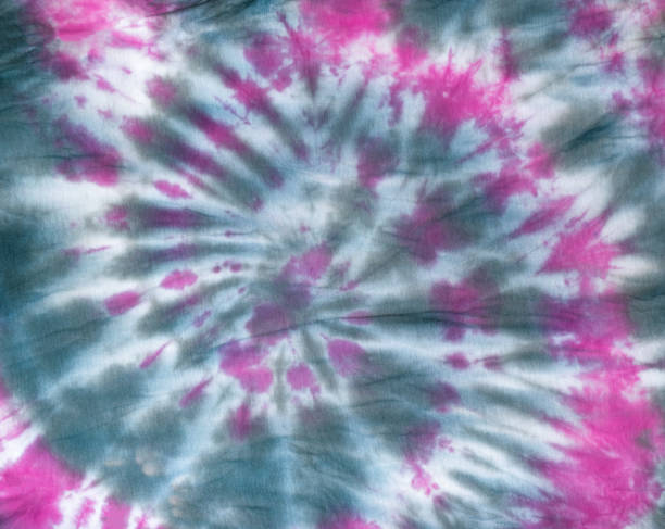 istock Colorful gray-red tie dye pattern on the fabric. Flat lay. 1407789336