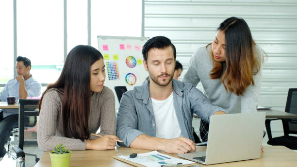 istock Creative team discussing about work at office, Small business teamwork planing business strategy, office life 1407792243