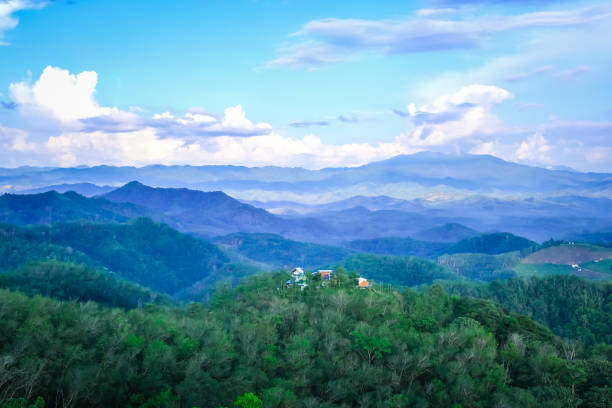 Landscape of misty mountains of Mt.Gunung Silipat stock photo