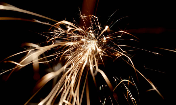 istock sparks in the dark. lines of light. 1407796589
