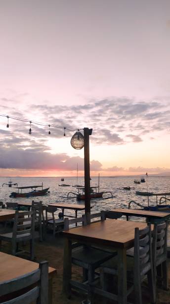 istock Portrait set of beachfront restaurant with ocean views 1407800124