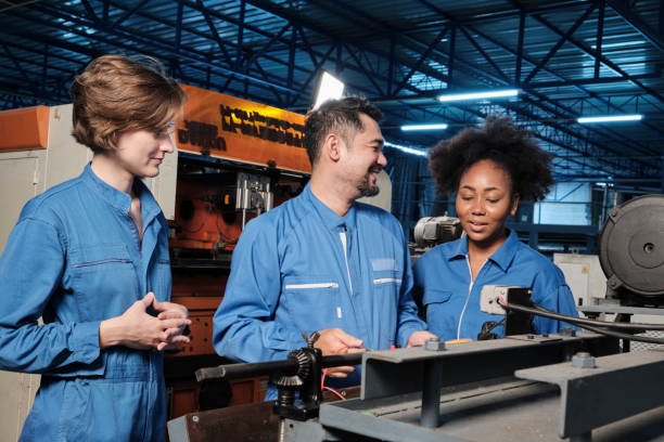istock Engineer teams inspect machines' electric current at the industry factory 1407801310