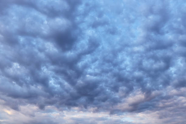 Dark blue sky with clouds stock photo