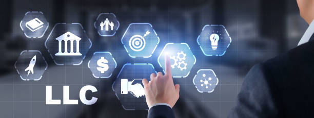 istock Limited Liability Company concept. Businessman touched LLC on virtual screen 1407812077