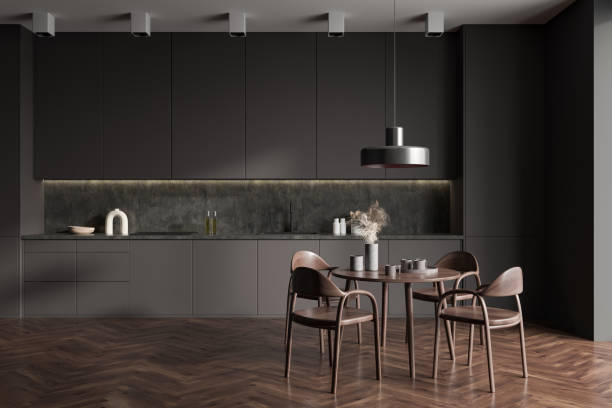 istock Grey kitchen interior with eating table and seats on wooden floor 1407817870