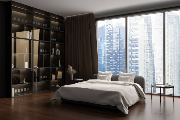istock Brown bedroom interior with bed and shelf with decoration, panoramic window 1407818598