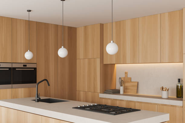 istock Light kitchen interior with island, sink and wooden shelves 1407818797