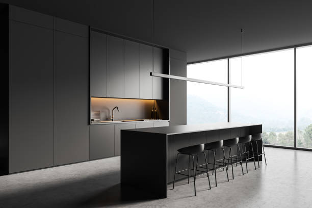 istock Grey kitchen interior with island and bar seats, shelves and window 1407819243