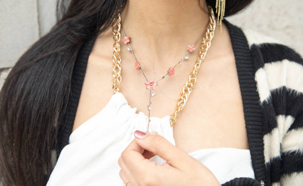istock Caucasian young woman wearing necklace. 1407825892