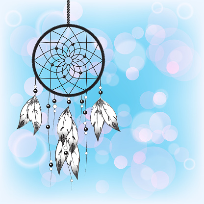 Dreamcatcher silhouetted against a blue sky background with space for your text. EPS10 vector format.