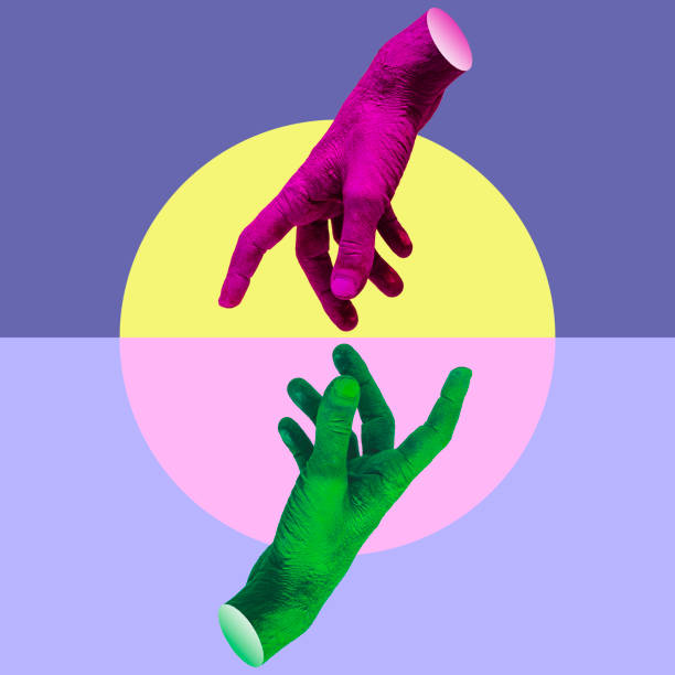 istock Two painted pink and green hands try to reach each other's fingers. Creative connecting conception. Collage art. 1407829331