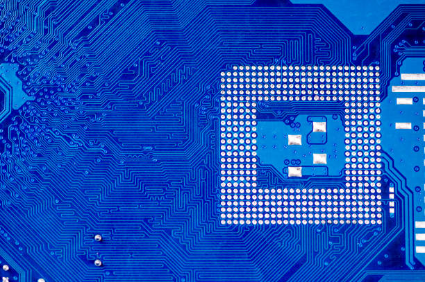 istock Close-up of a printed blue computer circuit board 1407829987