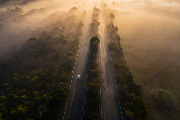 Aerial Fog Highway at Sunrise