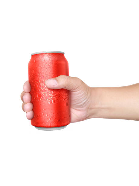 istock Man holding aluminum can with water droplets isolated on white background 1407830512
