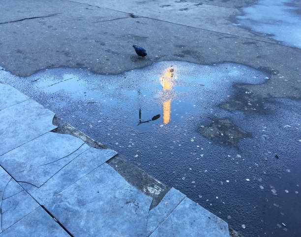 istock reflection of factory chimney 1407833110