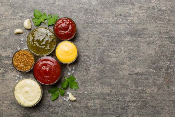istock Many different sauces and herbs on table, flat lay top view. sauces with spices healthy concept 1407834324