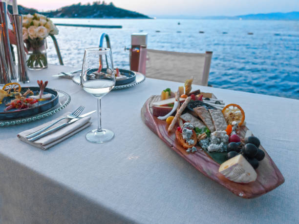 istock Plate with different types of cheese and fresh fruits 1407835400