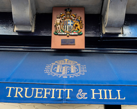 London, UK - August 12th 2021: A Royal Warrant plaque on the exterior of Truefitt and Hill hairdressers in central London, UK - by appointment to HRH The Duke of Edinburgh.