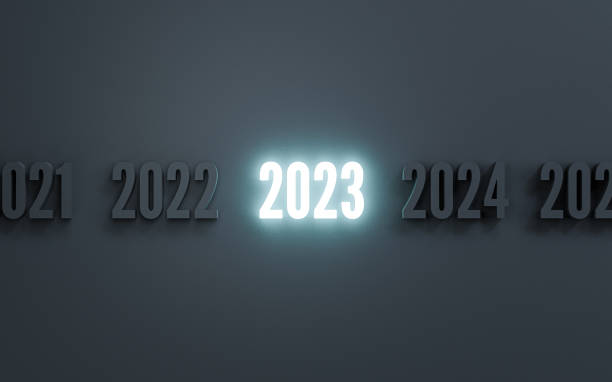 Glowing of 2023 year among normal number dark black background for preparation merry Christmas and happy new year concept by 3d render illustration. Glowing of 2023 year among normal number dark black background for preparation merry Christmas and happy new year concept by 3d render illustration. 2023 2022 stock pictures, royalty-free photos & images