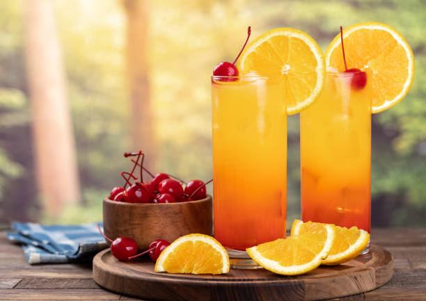 istock Tequila sunrise cocktail with rural background 1407843384
