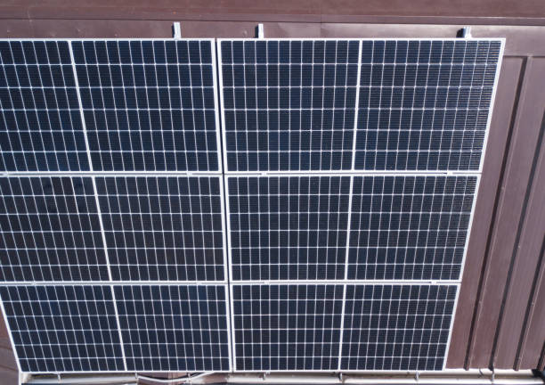 istock A Polycrystalline Solar panel system mounted on a ribbed metal roofing of a house. 1407844721