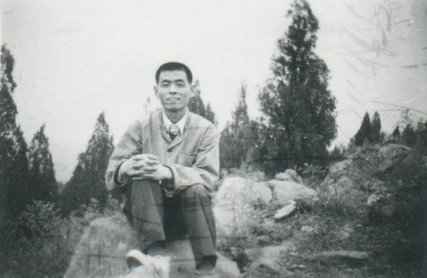 istock 1970s Chinese young men monochrome old photo 1407848231