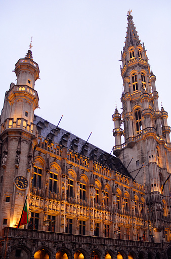 Hotel de Ville, or town hall, illuminated at sunset. Brussels, Belgium, Europe.