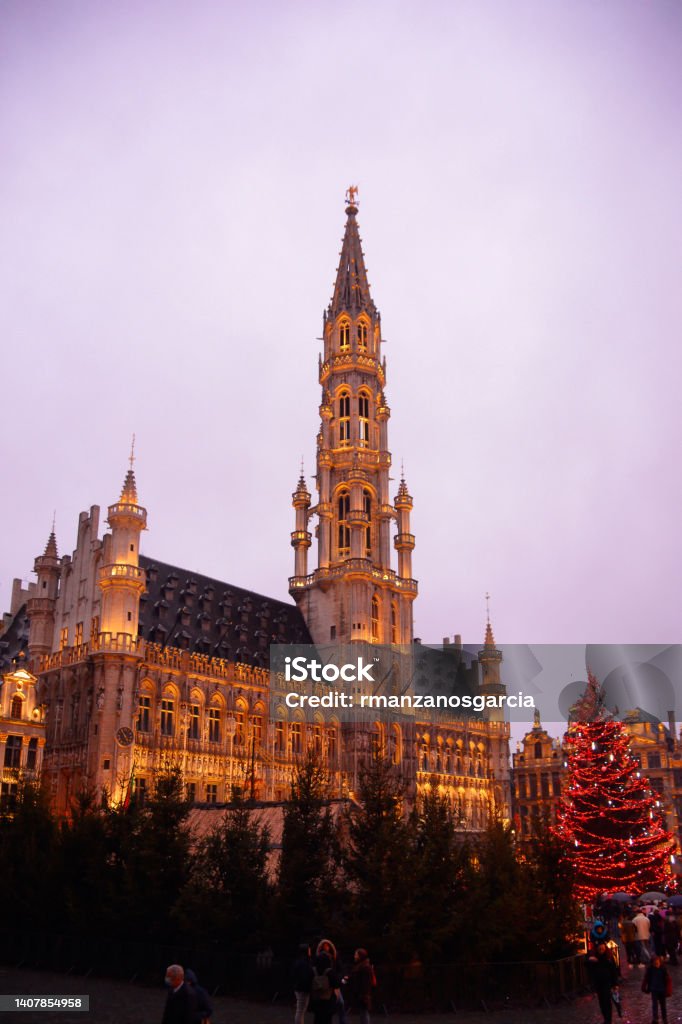 Hotel de Ville, Brussels, Belgium Hotel de Ville, or town hall, illuminated at sunset at Christmas. Brussels, Belgium, Europe. Brussels-Capital Region Stock Photo
