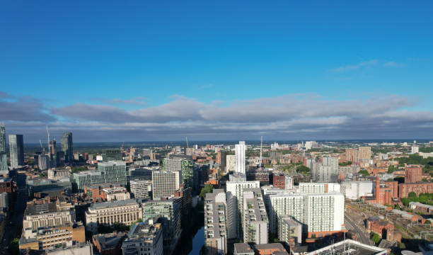 istock Manchester City Centre Drone Aerial View Above Building Work Skyline Construction Blue Sky Summer 2022 1407855191