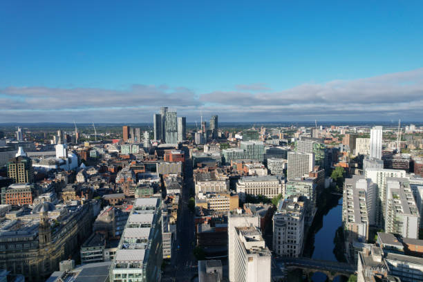 istock Manchester City Centre Drone Aerial View Above Building Work Skyline Construction Blue Sky Summer 2022 1407855195