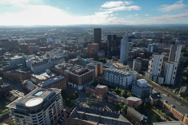 istock Manchester City Centre Drone Aerial View Above Building Work Skyline Construction Blue Sky Summer 2022 Beetham Tower Deansgate Square 1407855311