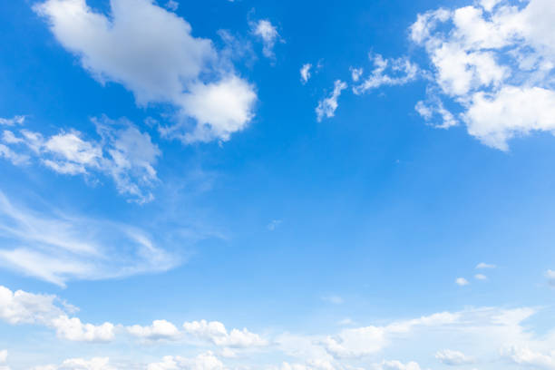 istock beautiful airatmosphere bright blue sky background abstract clear texture with white clouds. 1407857255