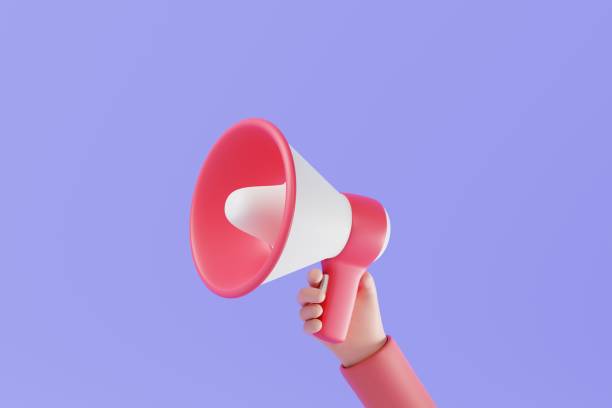 istock Hand holding speaker or megaphone on purple background. information announcement concept. 3d rendering 1407857270