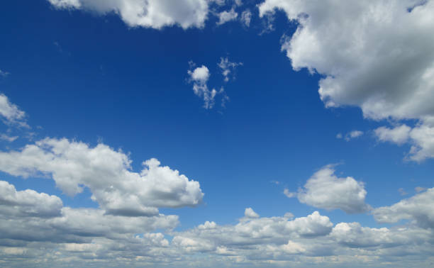 istock beautiful blue sky with clouds on bright sunny day for abstract background 1407859279