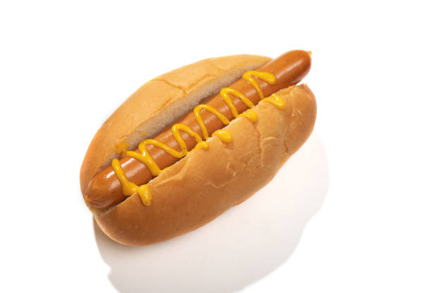 istock classic hot dog with mustard cut out on white background 1407863542