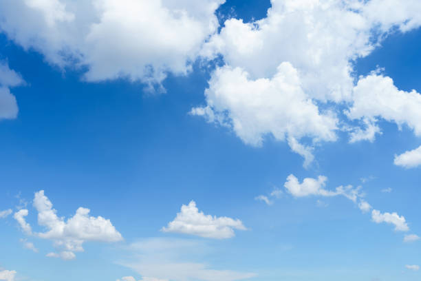 istock beautiful airatmosphere bright blue sky background abstract clear texture with white clouds. 1407863827