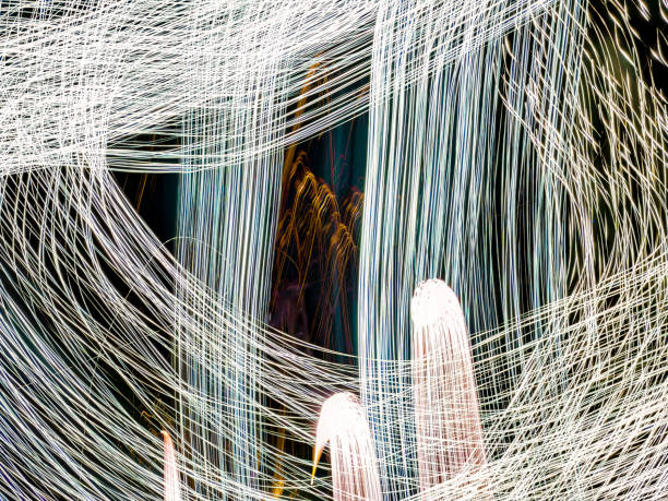 Light trails of fireworks at a holiday event stock photo